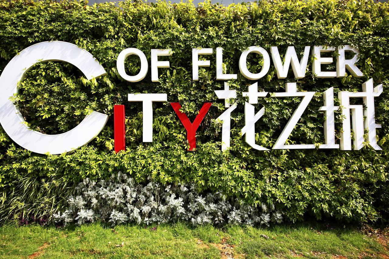 Howard Johnson Flower City Hotel Kunming Esterno foto
